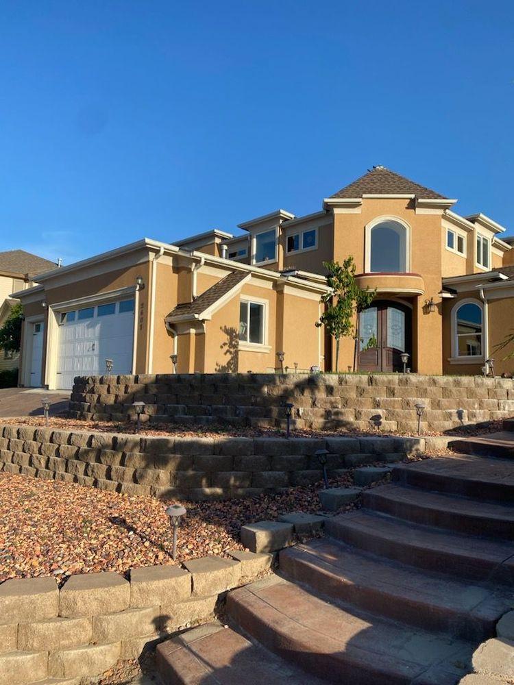 Two-story stucco home in Kennewick before and after soft washing (after)
