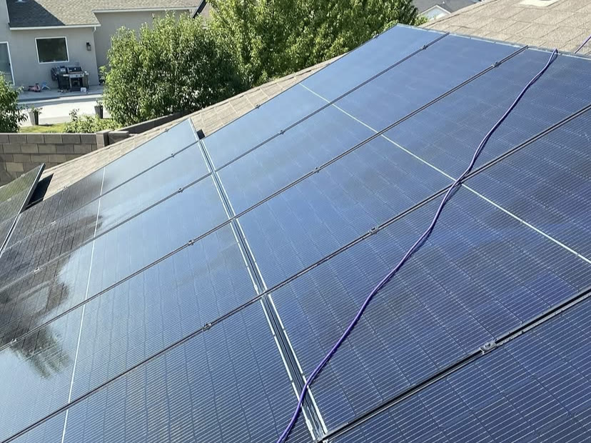 Rooftop solar array before and after cleaning (after)