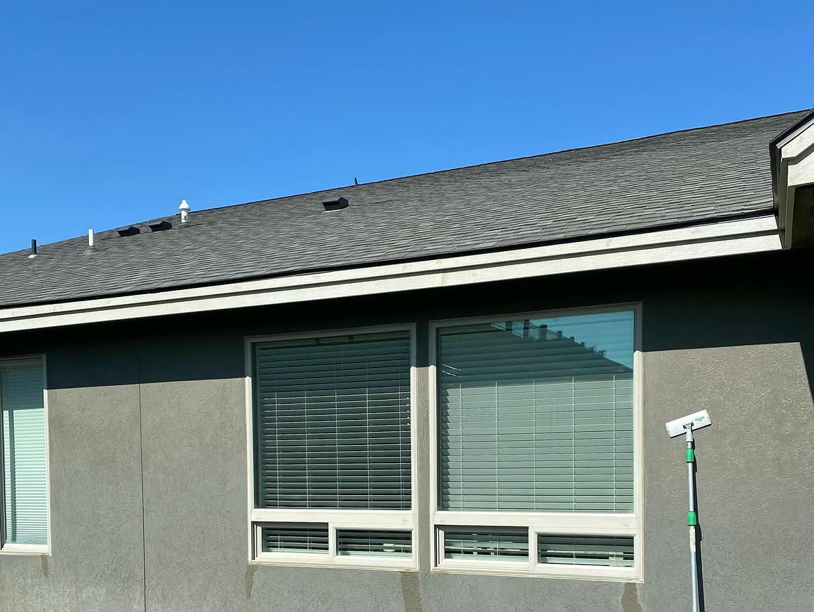 Two large windows on a Richland home before and after hard water spot removal (after)